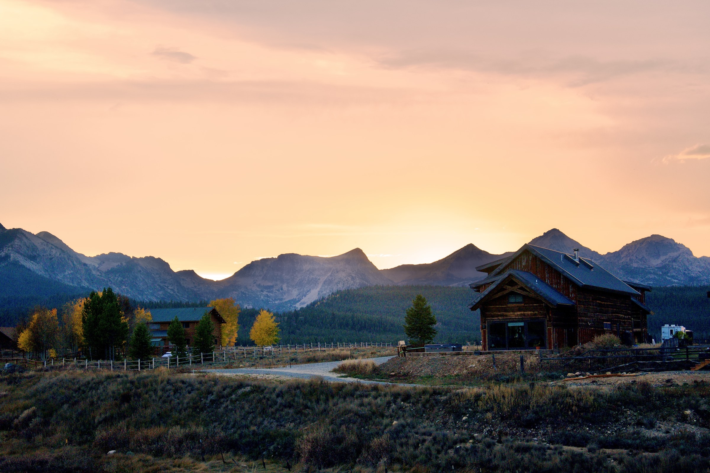 Sunset over a mountain lodge in the Sawtooth Valley