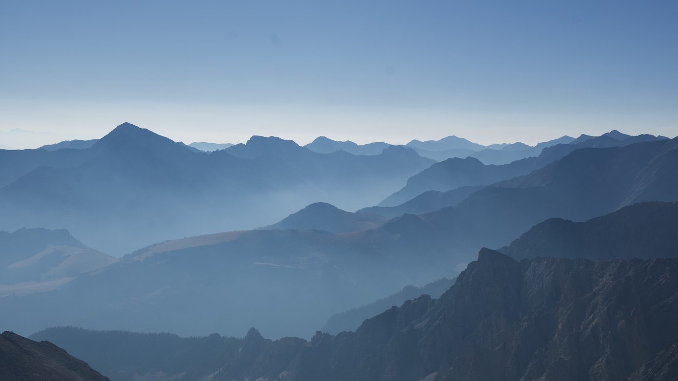 Layered blue mountain ridgelines